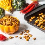 These roasted Thai curry pumpkin seeds are addicting! You've got to try this nice little twist when you make your roasted pumpkin seeds this fall. 