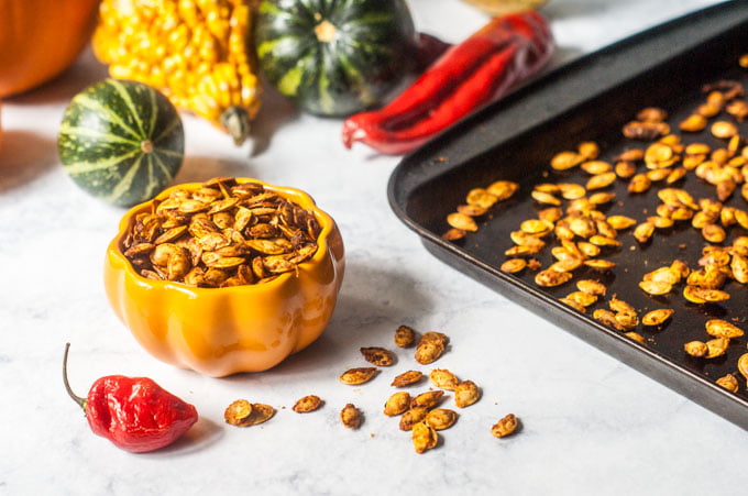 These roasted Thai curry pumpkin seeds are addicting! You've got to try this nice little twist when you make your roasted pumpkin seeds this fall. Only 2.1g net carbs per serving.