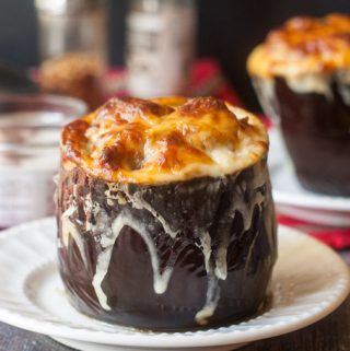 These sausage stuffed eggplant bowls are as tasty as they are fun to eat. Velvety eggplant and spicy sausage topped with cheese. 