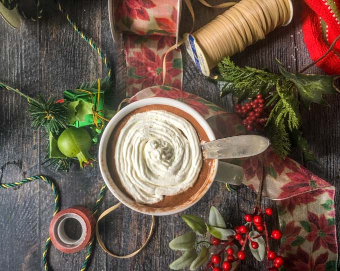 Santa's Little Helper - a low carb spiked cocoa is the perfect way to unwind during the holiday rush. Creamy, sweet and only 3.8g net carbs, you can drink this with or without alcohol to relax and treat yourself this Christmas.