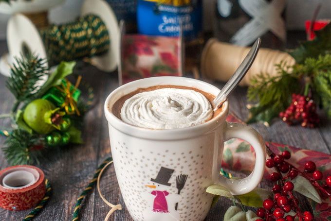 Santa's Little Helper - a low carb spiked cocoa is the perfect way to unwind during the holiday rush. Creamy, sweet and only 3.8g net carbs, you can drink this with or without alcohol to spread that holiday cheer!