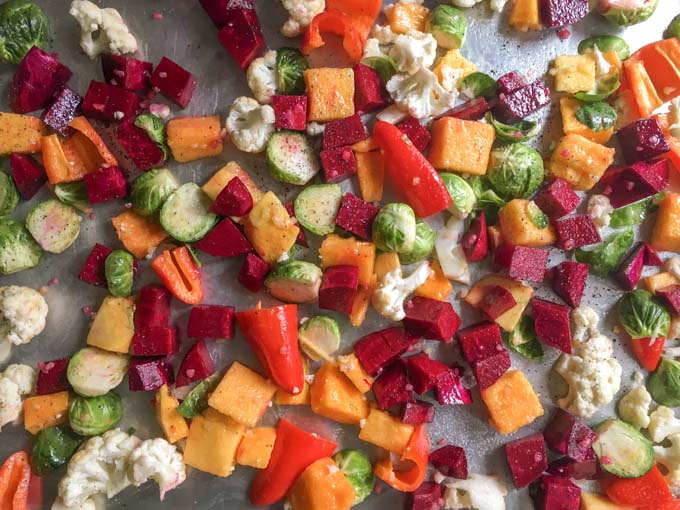 Just in time for the holiday season, this colorful and flavorful roasted vegetable & goat cheese salad is perfect for a crowd. Roasted winter vegetables are tossed in a light honeyed dressing and topped with tangy goat cheese.