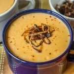 This butternut bisque with crispy onions is the perfect comfort food you can make in just 15 minutes. The smooth and creamy butternut soup has a hint of sweetness and is balanced with the crispy onions topping.