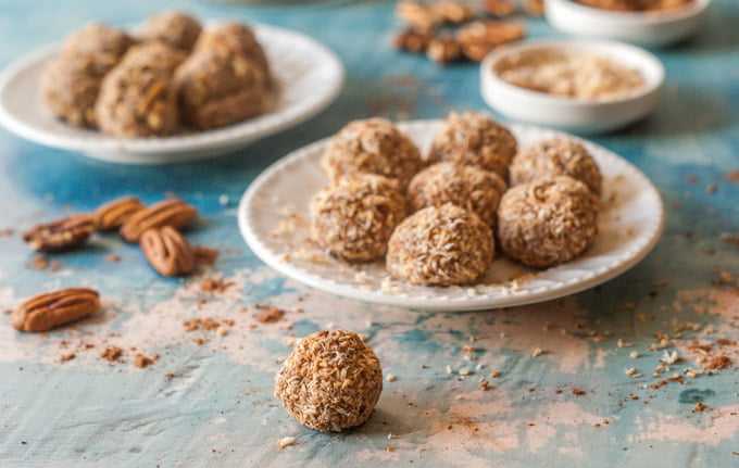 These low carb chocolate cheesecake bites are the perfect dessert or snack to have on hand when your sweet tooth comes a calling. Creamy chocolate cheesecake rolled in crunchy toasted coconut or toasted pecans for only 0.6g net carbs per bite.