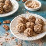 These low carb chocolate cheesecake bites are the perfect dessert or snack to have on hand when your sweet tooth comes a calling. Creamy chocolate cheesecake rolled in crunchy toasted coconut or toasted pecans for only 0.6g net carbs per bite.