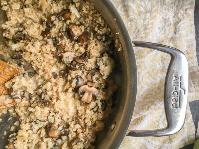This mushroom & brie cauliflower risotto is a rich and creamy low carb side dish that you can make in only 15 minutes. Best of all it's only 3.4g net carbs per serving.