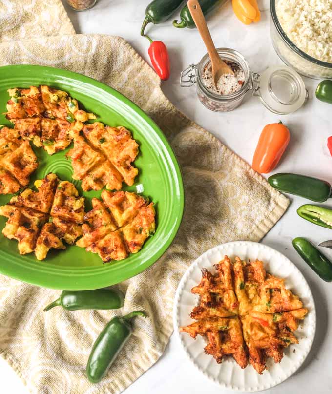 These low carb jalapeño popper waffles can be a great snack, lunch or even breakfast! They are savory waffles with a bit of a kick and only take a few minutes to make.  1.1g net carbs each.