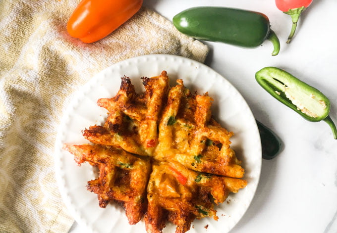 These low carb jalapeño popper waffles can be a great snack, lunch or even breakfast! They are savory waffles with a bit of a kick and only take a few minutes to make.  1.1g net carbs each.