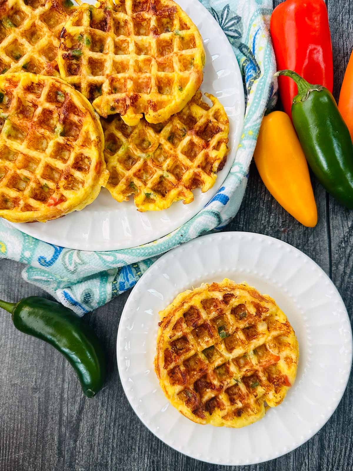 aerial view of plates of keto jalapeno cheddar waffles