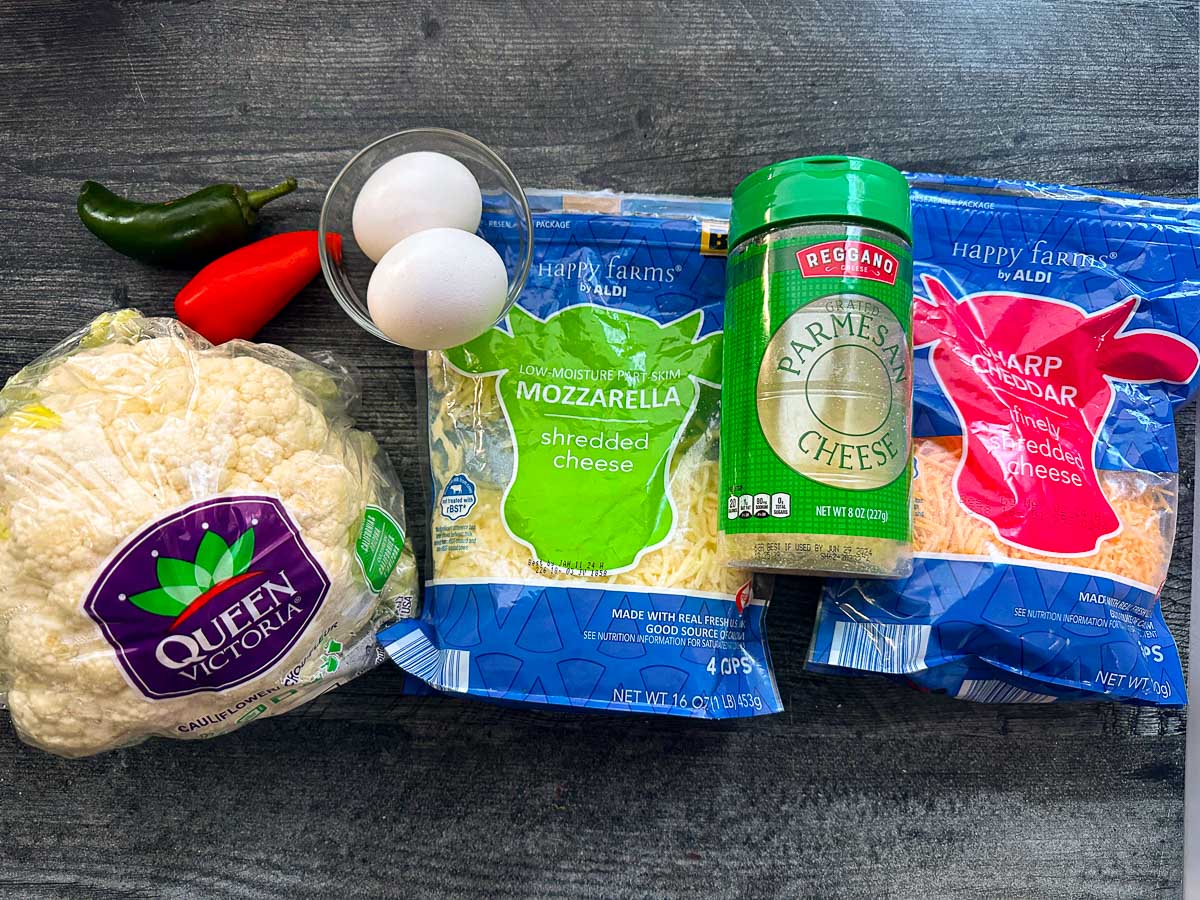 recipe ingredients - cauliflower, jalapeno peppers, parmesan cheese, cheddar, mozzarella and eggs
