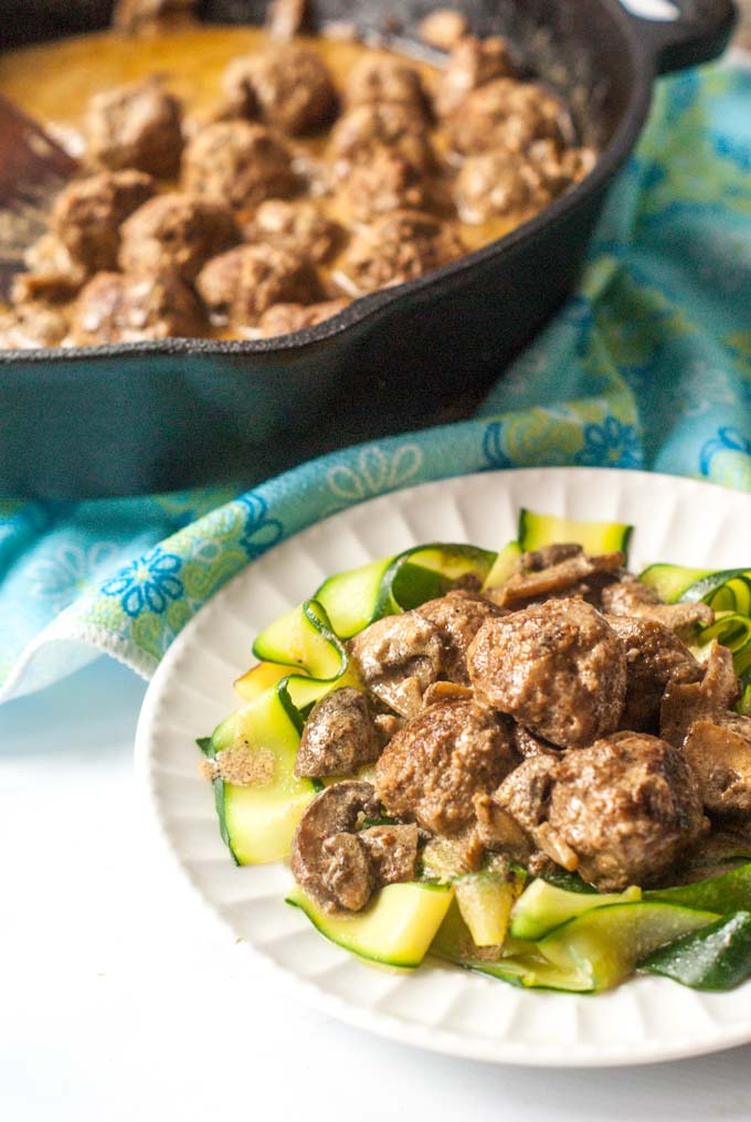 This low carb meatball stroganoff is the perfect way to top zucchini noodles. Creamy mushrooms sauce over beefy meatballs, you can even eat these as is or as an appetizer. 