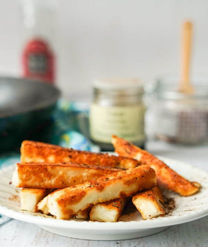 These za'atar halloumi cheese fries are a delicious low carb snack. Salty, briny halloumi cheese is simply pan fried and seasoned the bit of Middle Eastern za'atar spice. Only a few minutes to make, you will be crazy for this fried cheese snack.