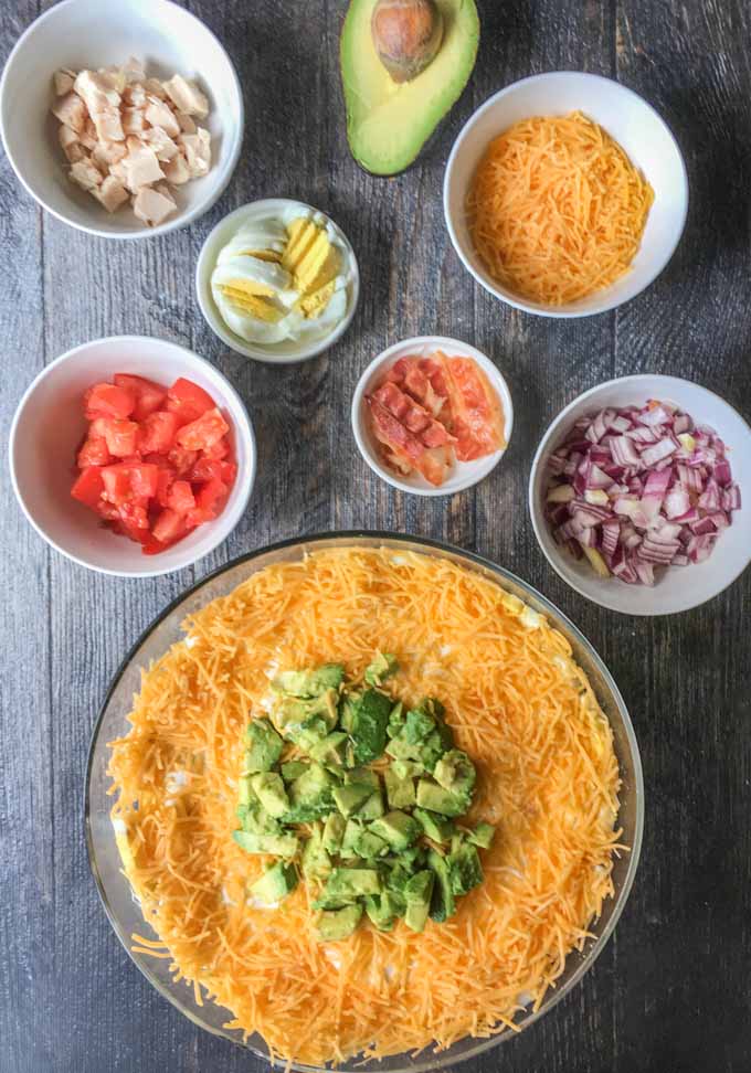 This low carb layered cobb salad is reminiscent of a seven layered salad but with all the fixing of a regular cobbb salad.