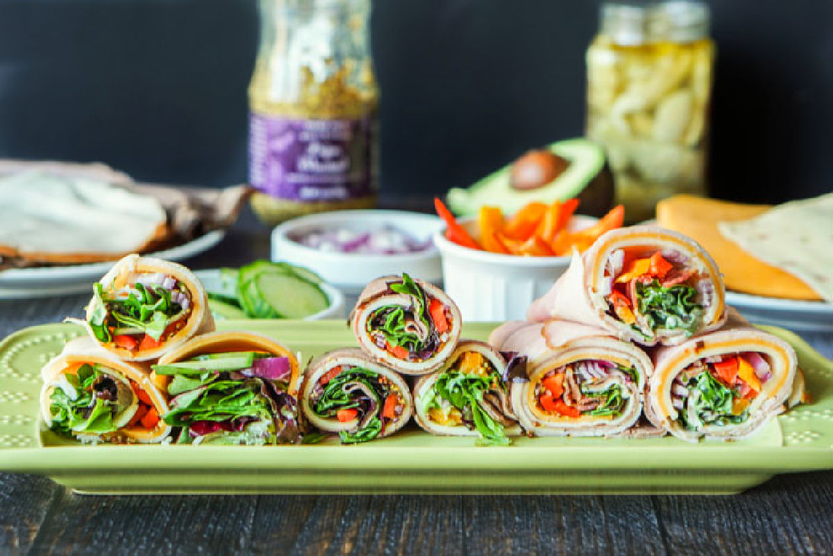 platter with meat and cheese rollups 