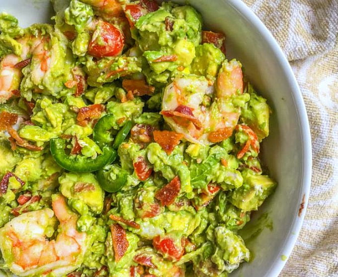 closeup bowl of keto avocado shrimp salad