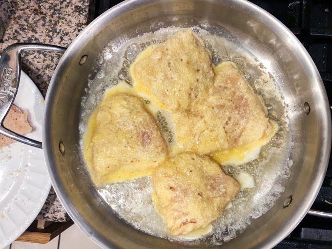 pan with battered chicken Romano cutlets