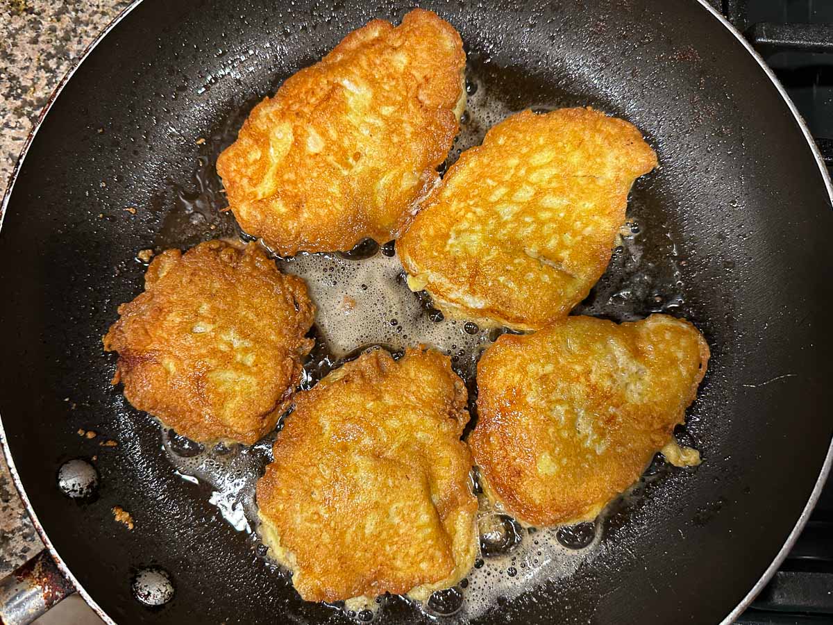 Skillet with the browned cutlets.