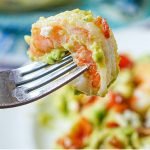 bowl with keto avocado shrimp salad and text