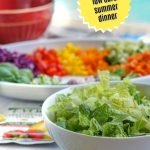 white bowl with low carb tuna spring roll salad and text overlay