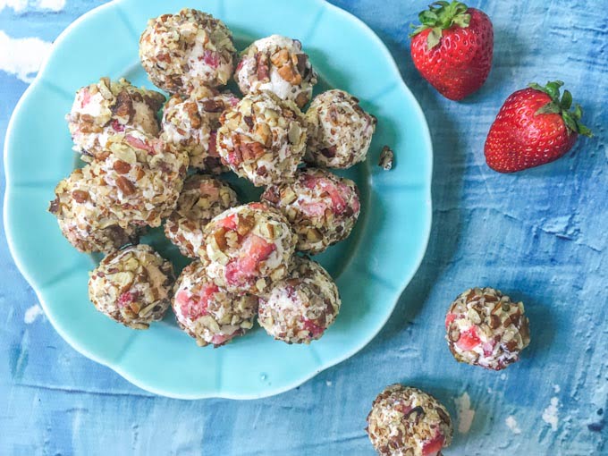 The strawberry cheesecake bites are a little bit of low carb heaven. They taste like strawberry pretzel salad rolled up in one low carb bite. Only a few ingredients needed  to make these and they are only 1.7g net carbs per bite!