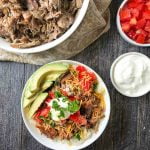 white bowl with slow cooker pulled pork and white bowl with rice bowl and text