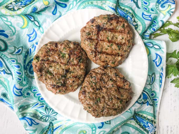 For a change of pace, try these grilled Middle Eastern lamb burgers. They make for a delicious low carb dinner as they are full of flavor and go well with a fresh garden salad. Each burger has only 1.8g net carbs per burger.