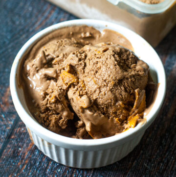 closeup of a ramekin of keto chocolate peanut butter ice cream