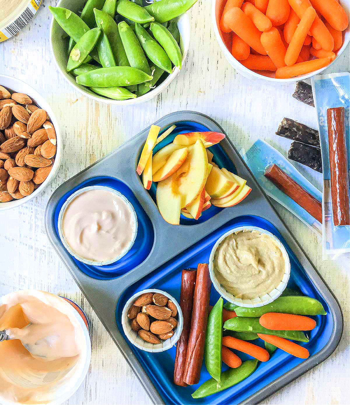 blue lunchbox with healthy foods for kids