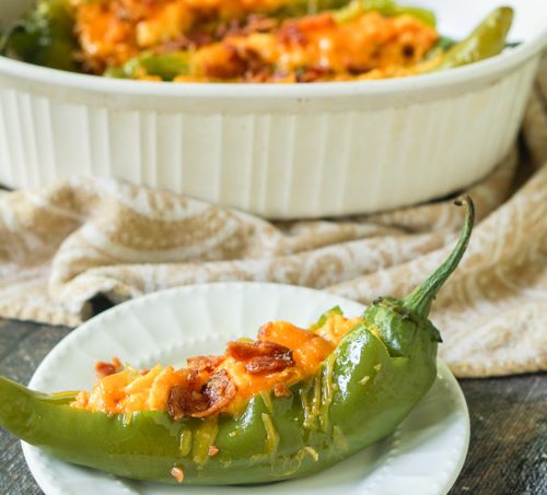 These low carb buffalo breakfast hatch chile peppers make for a delicious change from your standard eggs and bacon. A bit of spice along with cheese, chiles and bacon and you've got a low carb breakfast you can eat with your hands! Only 4.6g net carbs!