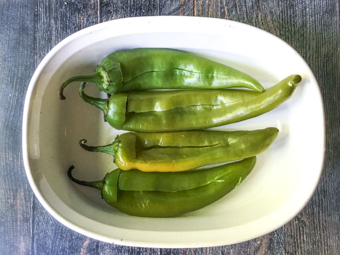 These low carb buffalo breakfast hatch chile peppers make for a delicious change from your standard eggs and bacon. A bit of spice along with cheese, chiles and bacon and you've got a low carb breakfast you can eat with your hands! Only 4.6g net carbs!