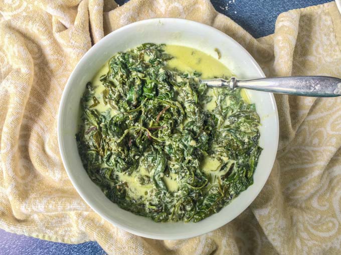 If you are looking for an easy low carb side dish, try this slow cooker greens Alfredo. Just a few ingredients to make this rich and creamy Alfredo sauce with a healthy dose of power greens. Only 4g net carbs per serving.
