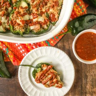 These bbq pulled pork stuffed poblanos work as a low carb appetizer, snack or even dinner. The poblanos have bit of heat, while the bbq pork has sweetness and spice and the cheddar cheese pulls it all together.  Only 4.3g net carbs per stuffed pepper. 