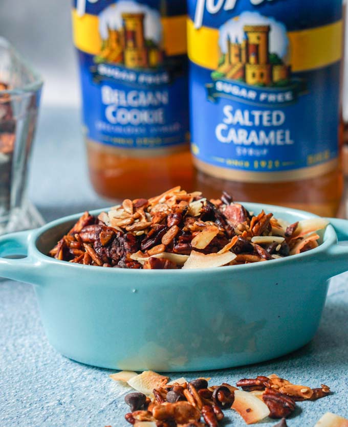 blue bowl with samoa gluten free granola with two Torani sugar free syrups in the background