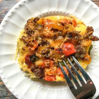 This spaghetti squash low carb breakfast casserole is your new best friend. Full of tasty toppings with a cheesy, spaghetti squash base makes for a delicious low carb breakfast. Each serving is only 3.9g net carbs!