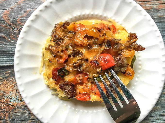 This spaghetti squash low carb breakfast casserole is your new best friend. Full of tasty toppings with a cheesy, spaghetti squash base makes for a delicious low carb breakfast. Each serving is only 3.9g net carbs!