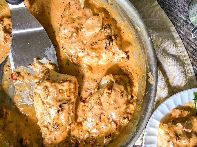 For an easy fish dinner, try this low carb, creamy sun dried tomato cod. You can have dinner on the table in less than 30 minutes and it's rich, creamy and delicious! Only 1.6g. net carbs per serving.
