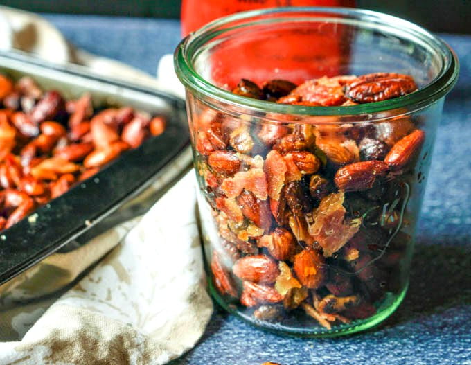 If you are looking for a new low carb snack, try this maple bacon roasted nut mix. Bits of bacon scattered among roasted nuts that are flavored with maple make the perfect salty, sweet snack.
