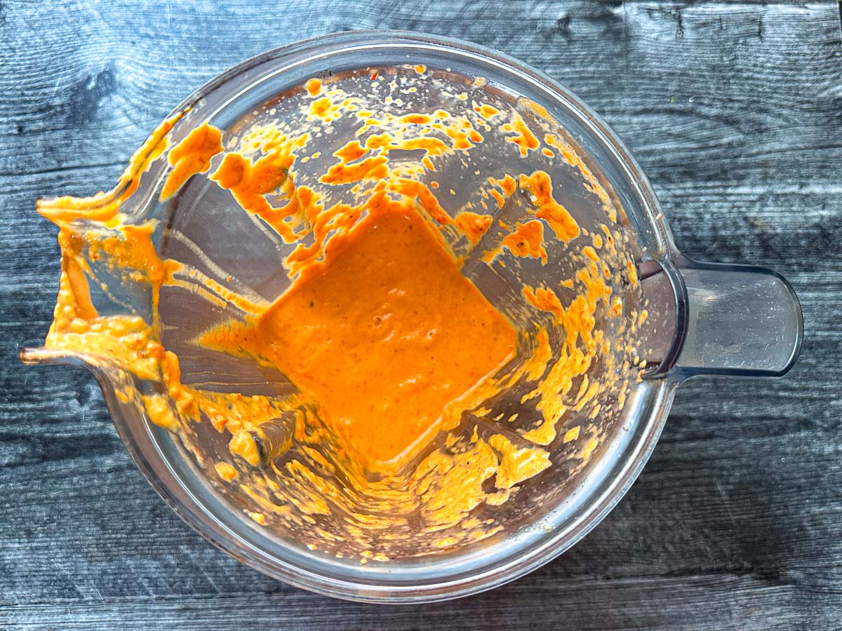 Blender with the blended sauce.
