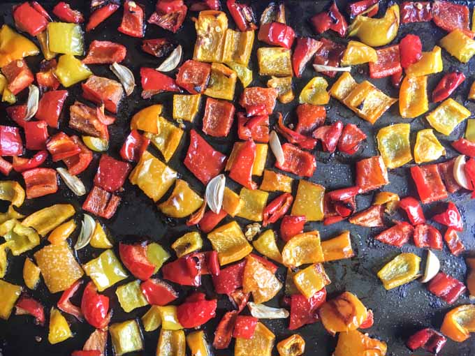 cookie sheet with roasted peppers and garlic