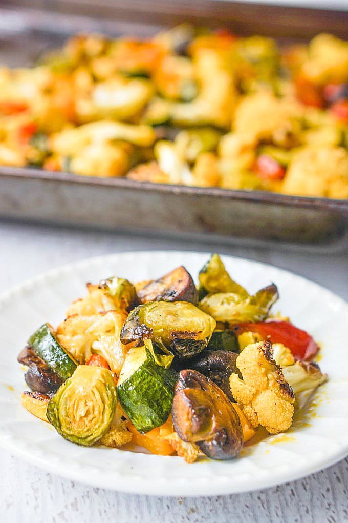 These red palm oil roasted winter vegetables are a healthy and tasty side dish you can easy whip up any day of the week. The red palm oil is a superfood and coupled with seasonly vegetables makes for a healthy dish.