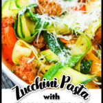 Closeup of a white bowl with the keto zucchini pasta with sausage and peppers dish and text.