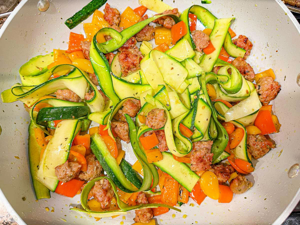 Saute pan with the all the veggies in it.