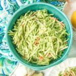 This low carb broccoli slaw is dressing a delicious creamy ginger dressing with lemon and garlic. It's a fresh and easy low carb salad that you can put together in 5 minutes and only has 4.3g net carbs!