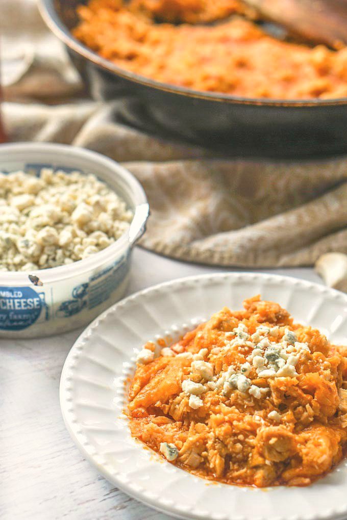 This low carb buffalo cauliflower rice with chicken dish is a very easy and delicious one pot dinner that you can make in just 15 minutes. This is the perfect quick and easy low carb dinner or lunch and each serving has only 3.7g net carbs!