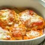 This low carb chicken parmesan dinner is so easy and delicious you will want to make it every week. Only a few ingredients and you can make this gluten free chicken dinner that has 4.3g net carbs per serving.