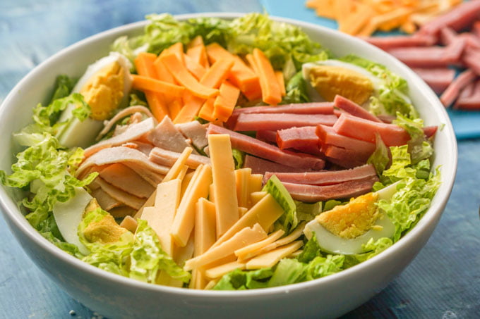 This low carb chef salad is a hearty salad you can eat for dinner and feel very satisfied. I topped mine with a low carb red roquefort dressing that was sweet, tangy and full of blue cheese.  Only 3.0g net carbs for the whole salad. 