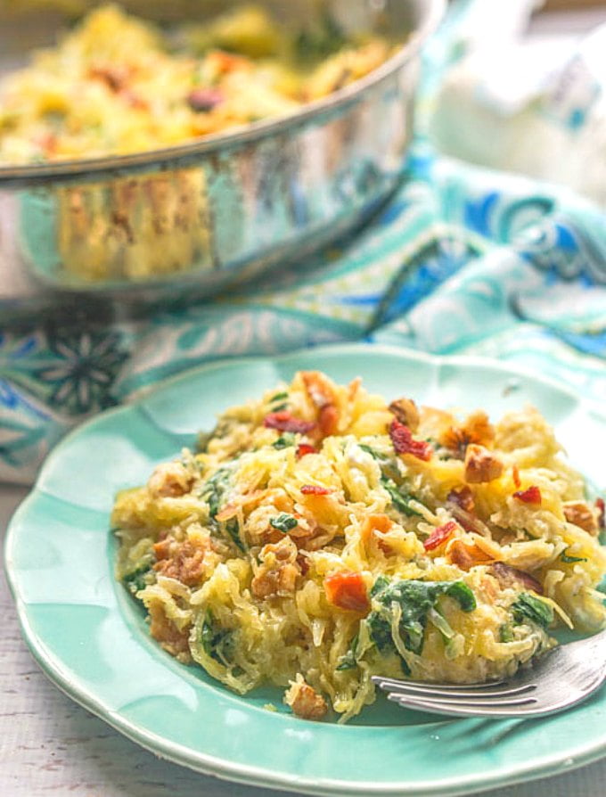This tasty low carb spaghetti squash pasta is so easy you can make it in 5 minutes with already cooked ingredients or 20 if you don't. Tangy goat cheese, crunchy walnuts and crispy bacon add lost of flavor to this gluten free pasta dish!