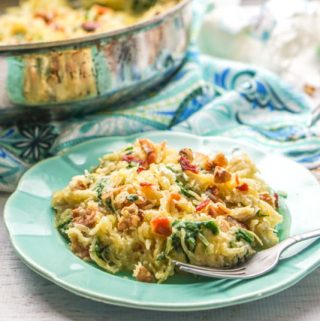 This tasty low carb spaghetti squash pasta is so easy you can make it in 5 minutes with already cooked ingredients or 20 if you don't. Tangy goat cheese, crunchy walnuts and crispy bacon add lost of flavor to this gluten free pasta dish!