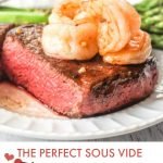 Two filets on a bed of asparagus with shrimp on top with text overlay.