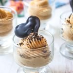 Featured photo of keto peanut butter mousse with a chocolate heart on top.